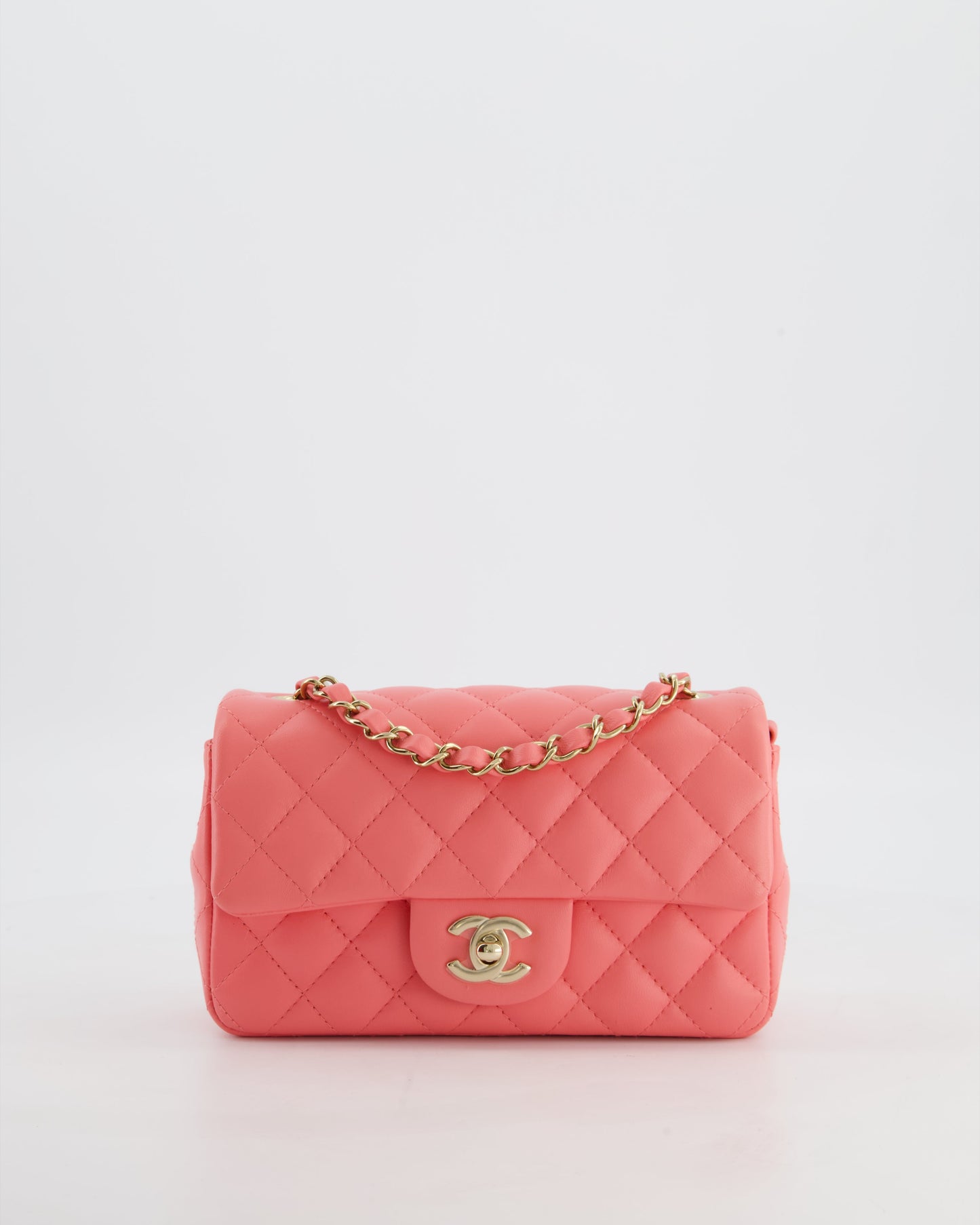 Chanel Classic Mini Rectangular Flap Bag in Hot Pink Lambskin Leather with Champagne Gold Hardware