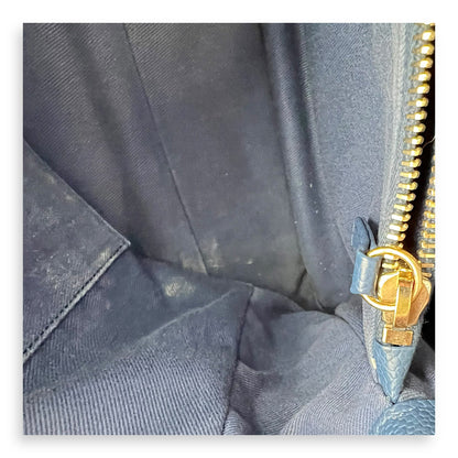CC Lock Top Handle Bag Blue in Caviar Leather, Gold hardware