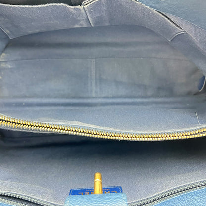 CC Lock Top Handle Bag Blue in Caviar Leather, Gold hardware