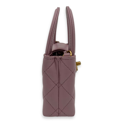 Kelly Top Handle Bag Nano Pink in Calfskin, Gold hardware