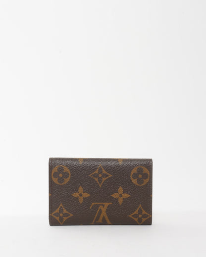Louis Vuitton Monogram Coated Canvas & Fuchsia 6 Key Holder