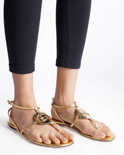 Gucci Ankle Strap Flats In Gold Tone