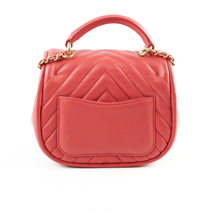 Chanel Lambskin Reverse Chevron Round Flap Bag