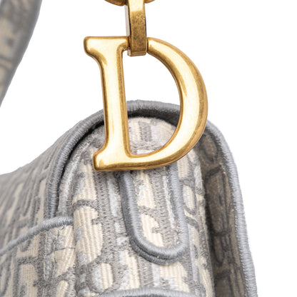 Oblique Embroidered Canvas Saddle Bag