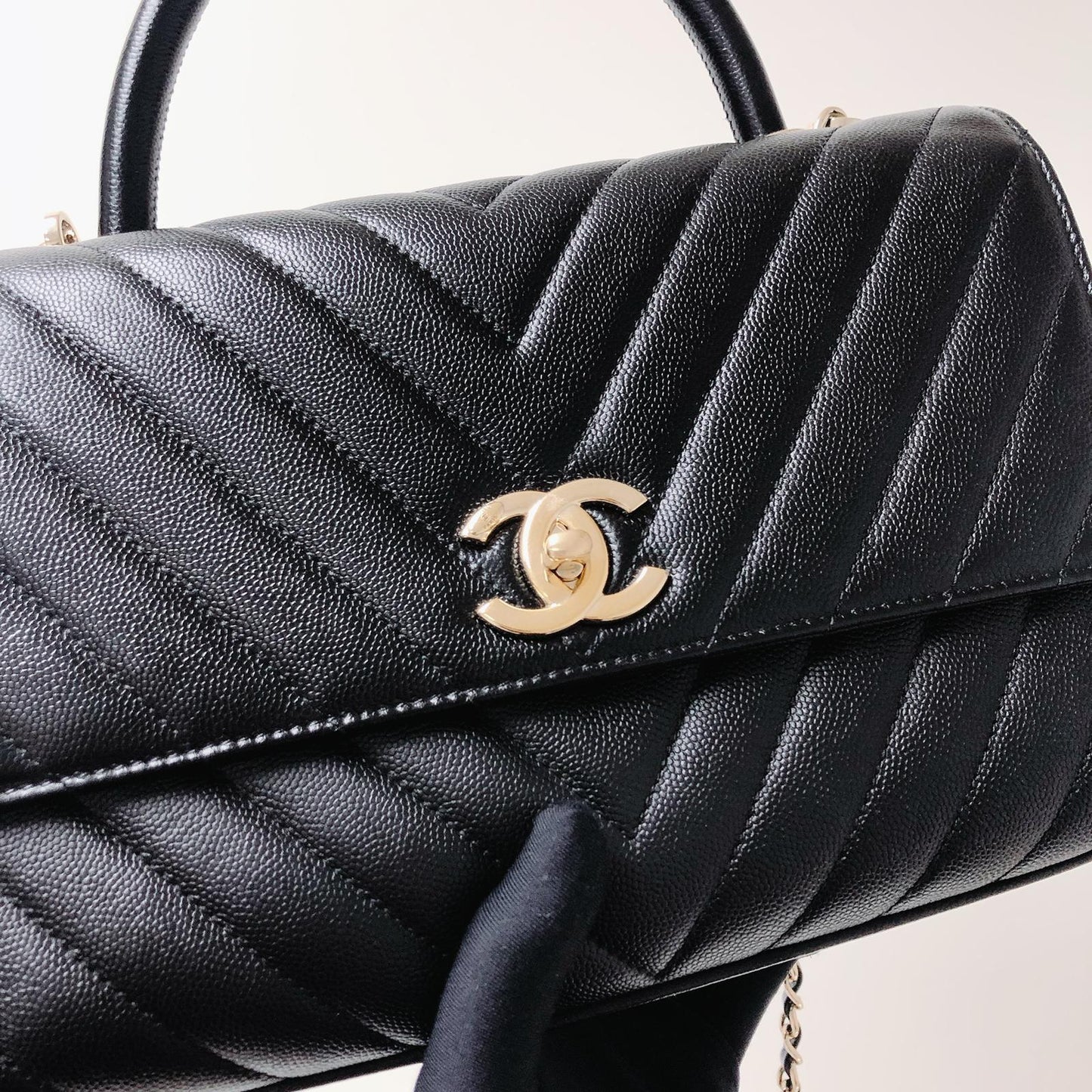 Coco Handle Medium Chevron Flap Bag in Black with GHW