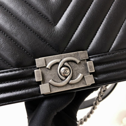 Chevron Caviar Old Medium Boy Bag in Black with SHW