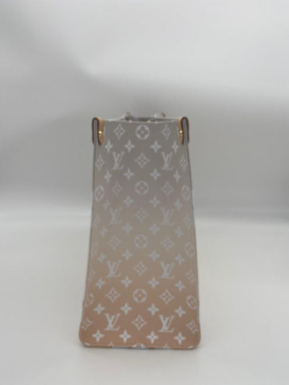 Louis Vuitton On The Go Cream GM