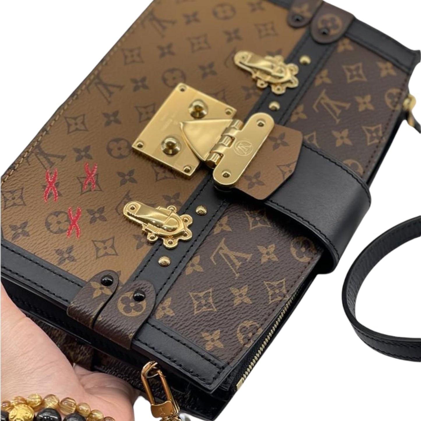 Louis-Vuitton Trunk Clutch Reverse Monogram GHW