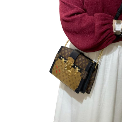 Louis-Vuitton Trunk Clutch Reverse Monogram GHW