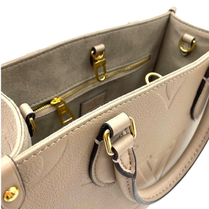 Louis-Vuitton MM Onthego Monogram Empreinte Turtledove GHW