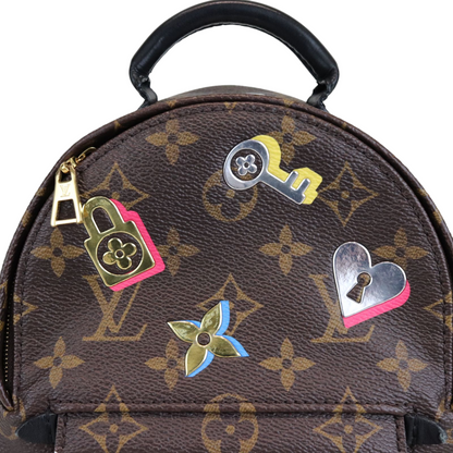 Louis-Vuitton Monogram Love Lock Mini Palm Springs Backpack