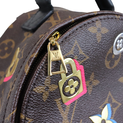Louis-Vuitton Monogram Love Lock Mini Palm Springs Backpack