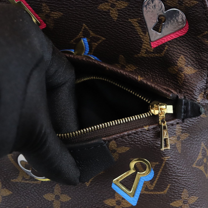 Louis-Vuitton Monogram Love Lock Mini Palm Springs Backpack