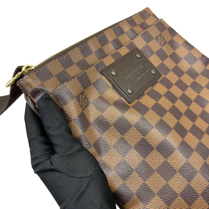 Louis-Vuitton Brooklyn Flat Pochette Damier Ebene Brown GHW