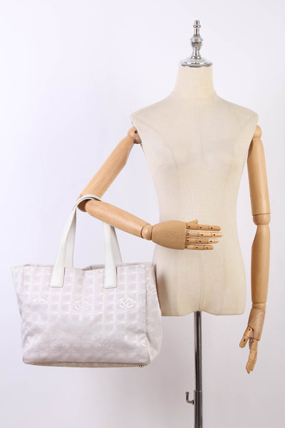 Chanel New Travel Line Tote Bag Canvas Tote Bag in Good condition