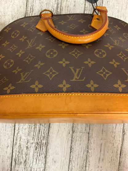 Handbag Designer By Louis Vuitton  Size: Medium