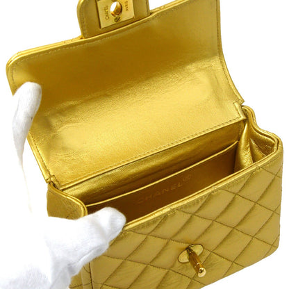 CHANEL Classic Flap Handbag Micro Gold Lambskin ao29040