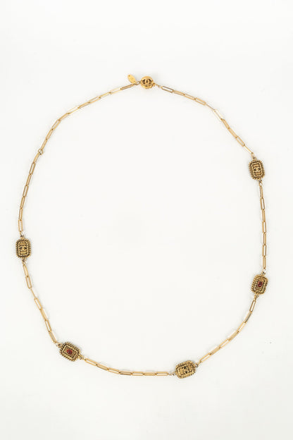 Collier doré Chanel 1984