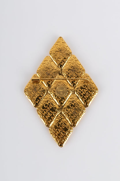 Broche dorée Chanel