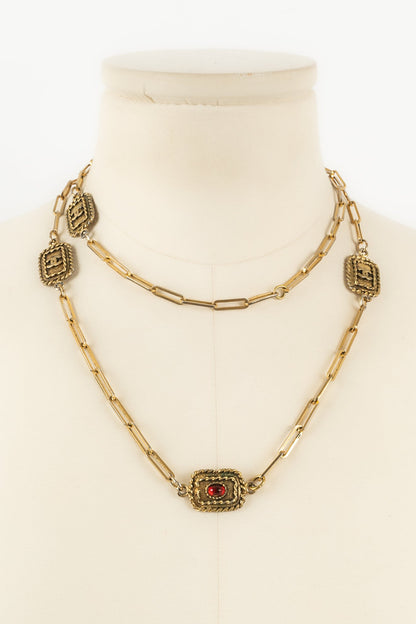 Collier doré Chanel 1984