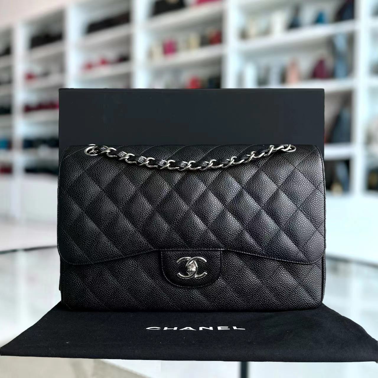 Caviar Jumbo Double Flap Classic Flap Quilted Grained Calfskin Black Silver Hardware Series 15
