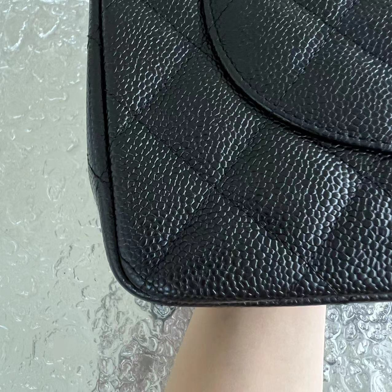 Caviar Jumbo Double Flap Classic Flap Quilted Grained Calfskin Black Silver Hardware Series 15