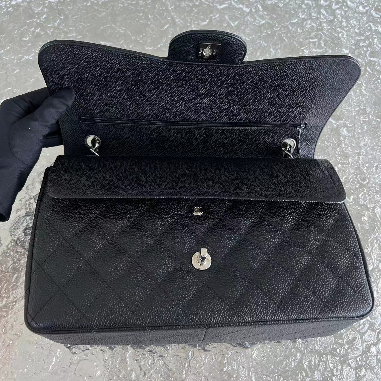 Caviar Jumbo Double Flap Classic Flap Quilted Grained Calfskin Black Silver Hardware Series 15