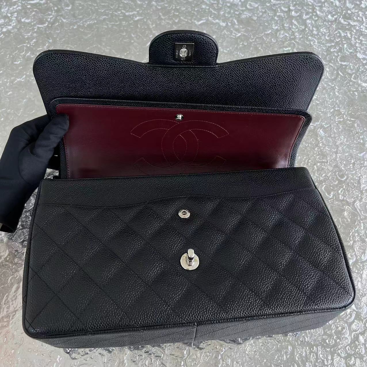 Caviar Jumbo Double Flap Classic Flap Quilted Grained Calfskin Black Silver Hardware Series 15