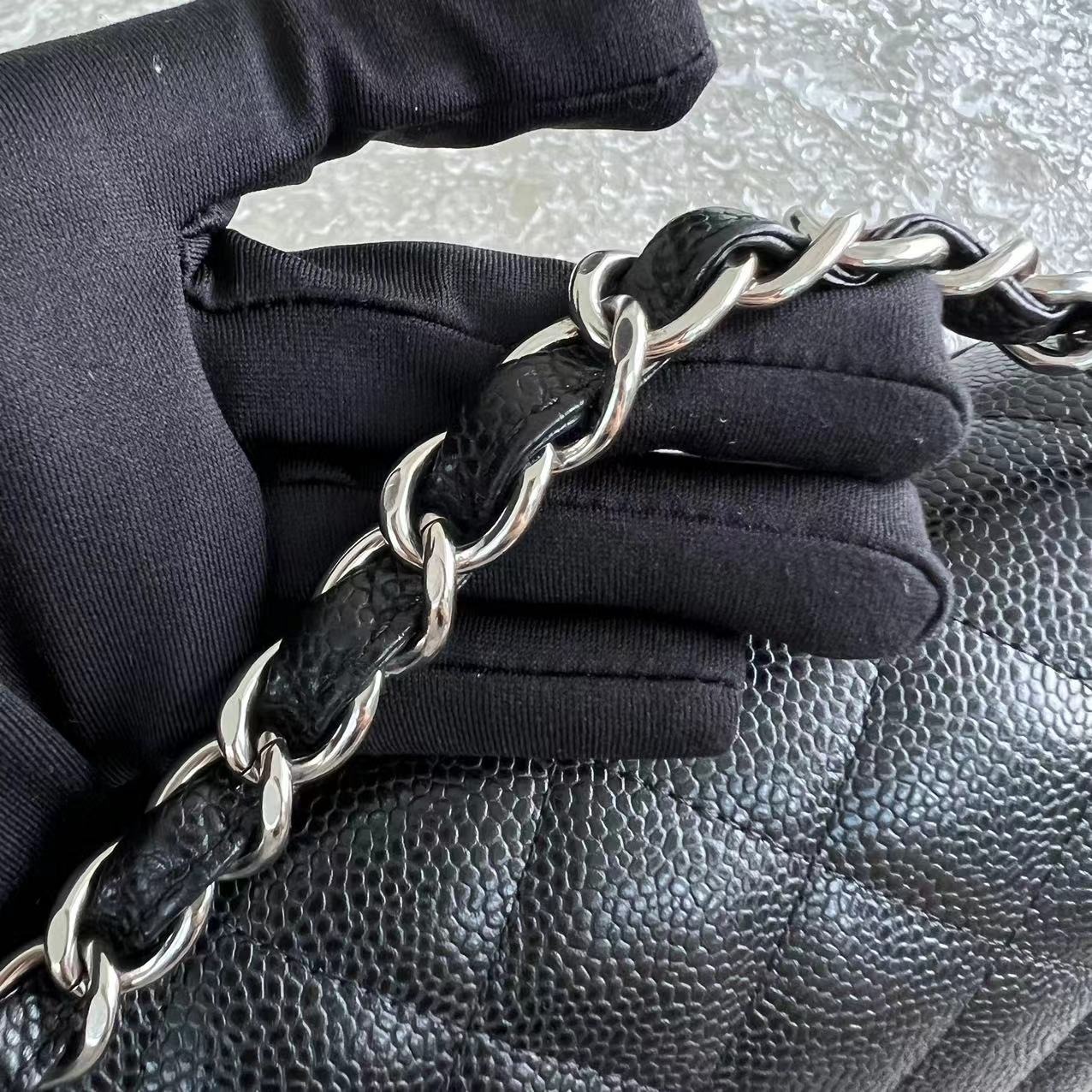 Caviar Jumbo Double Flap Classic Flap Quilted Grained Calfskin Black Silver Hardware Series 15