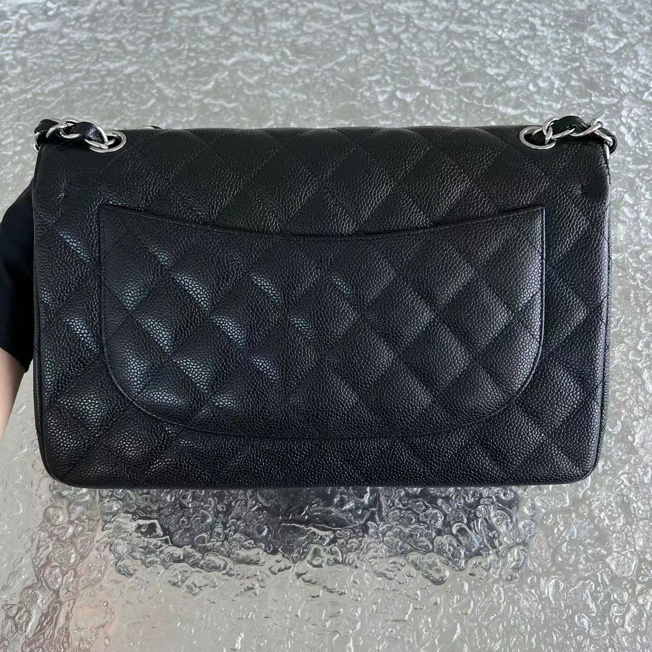 Caviar Jumbo Double Flap Classic Flap Quilted Grained Calfskin Black Silver Hardware Series 15