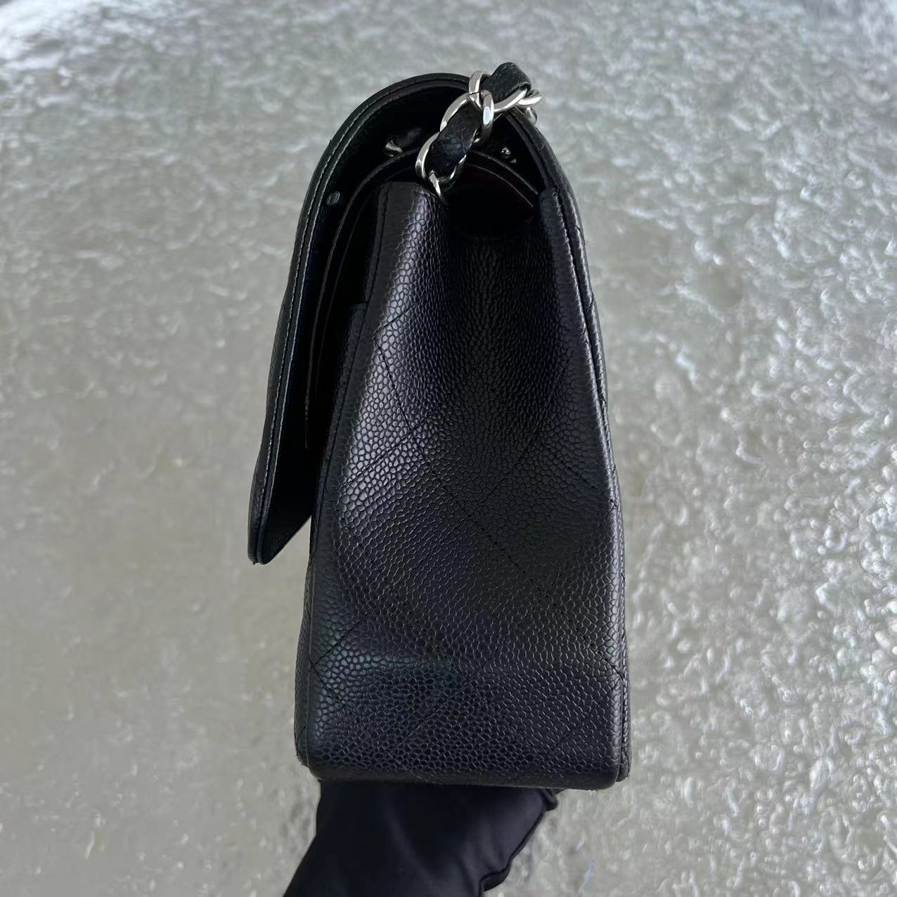 Caviar Jumbo Double Flap Classic Flap Quilted Grained Calfskin Black Silver Hardware Series 15