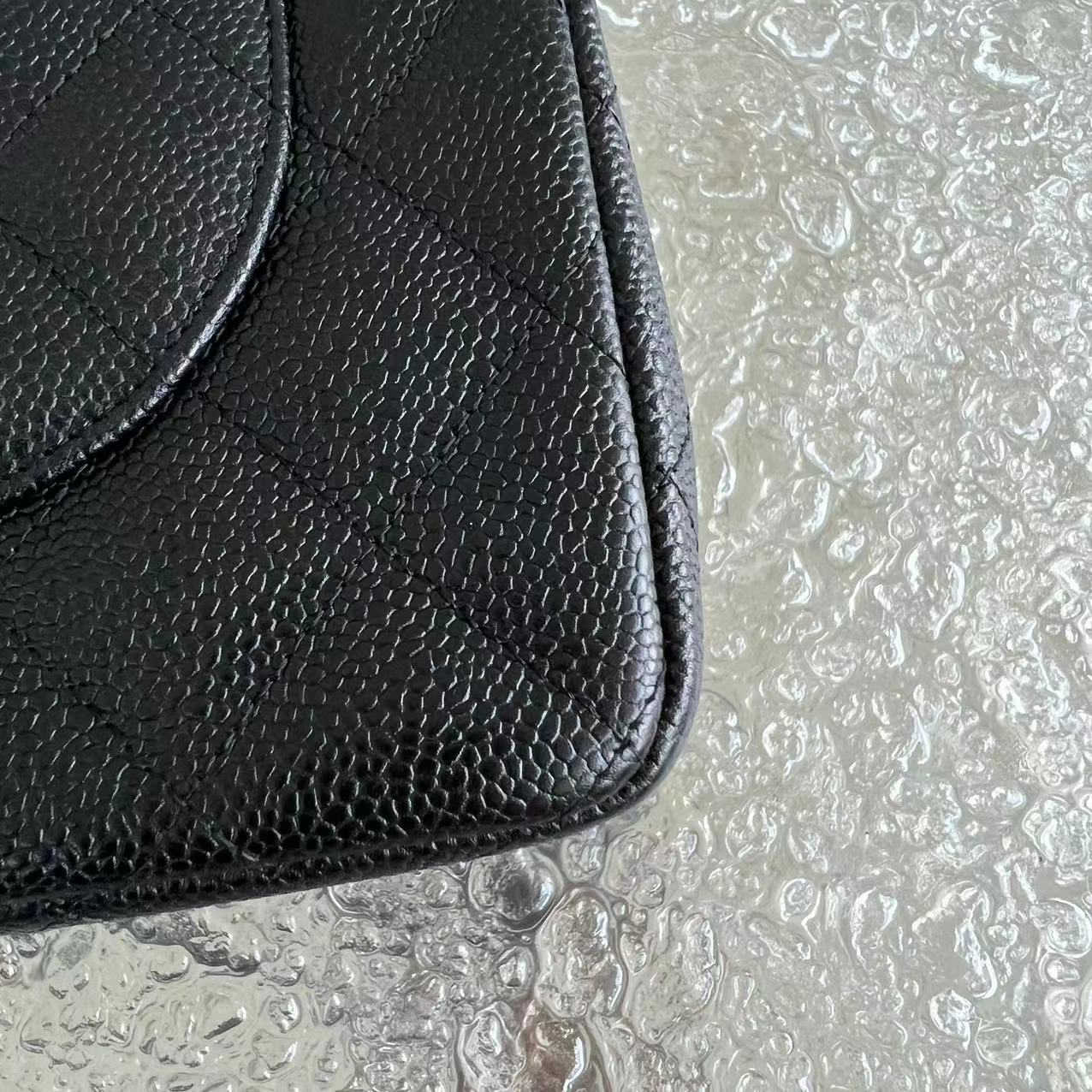 Caviar Jumbo Double Flap Classic Flap Quilted Grained Calfskin Black Silver Hardware Series 15