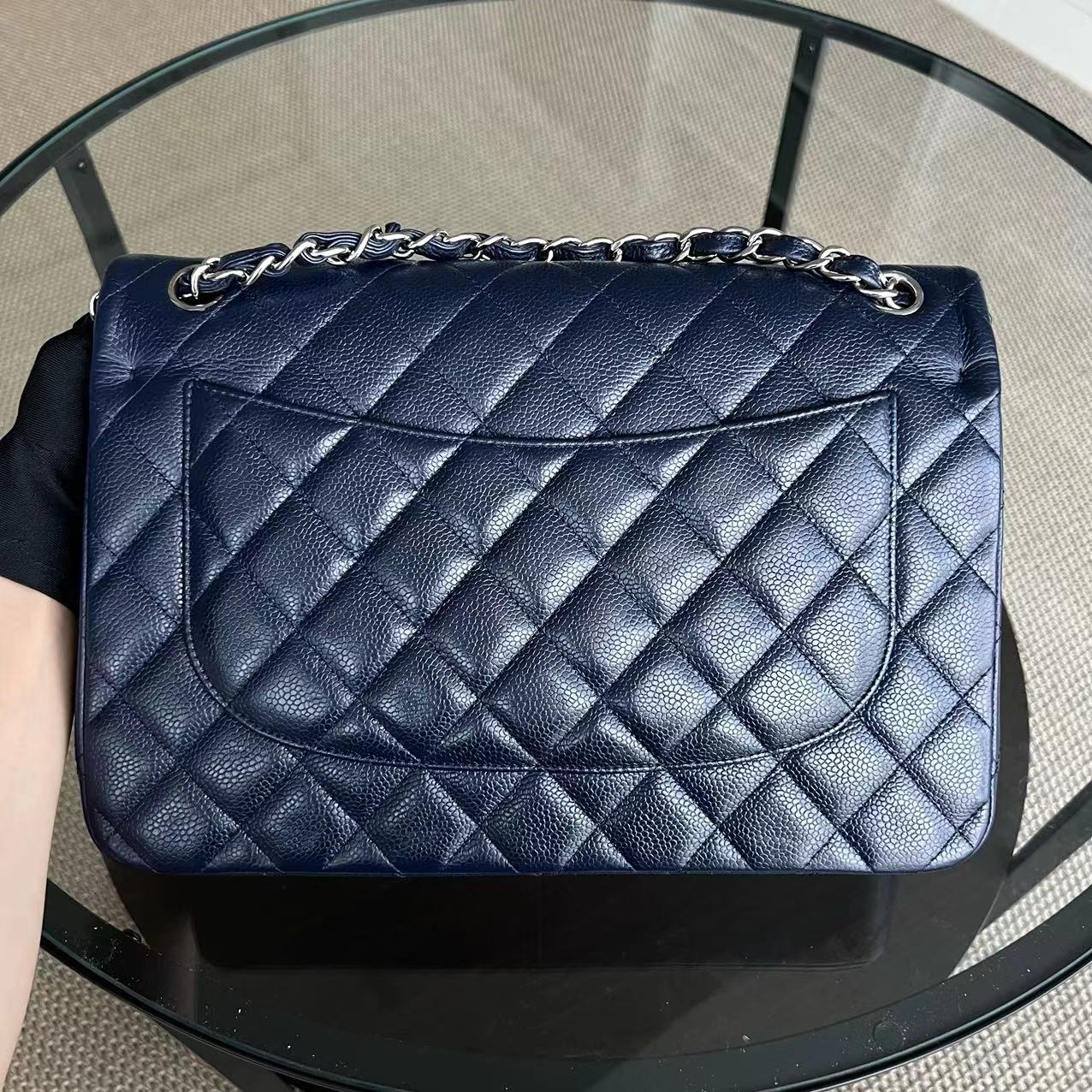 Caviar Jumbo Double Flap Classic Flap Quilted Grained Calfskin Dark Blue Silver Hardware Series 19