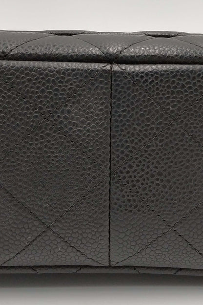 Quilted Caviar Jumbo Classic Single Flap Bag Black with Gold Hardware