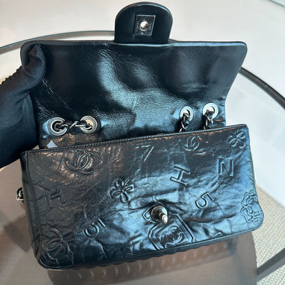 Seasonal Flap Previous Symbols Flap Bag Embossed Calfskin Black SHW No 19