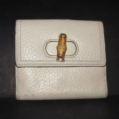 Vintage Gucci Ivory Pebbled Bi-fold Bamboo Accent