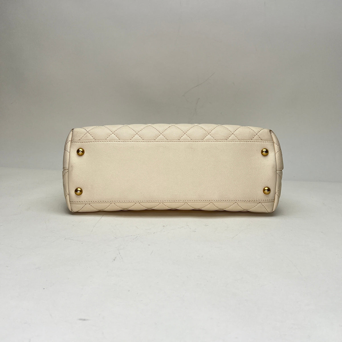 Coco Medium Beige Top Handle Bag in Caviar Leather, Gold hardware