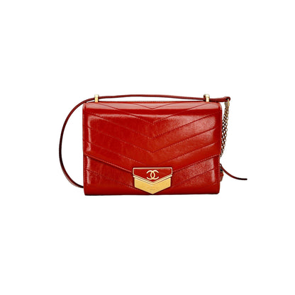 Chevron Medal Flap  Orange Crossbody Bag in Calfskin, Gold hardware