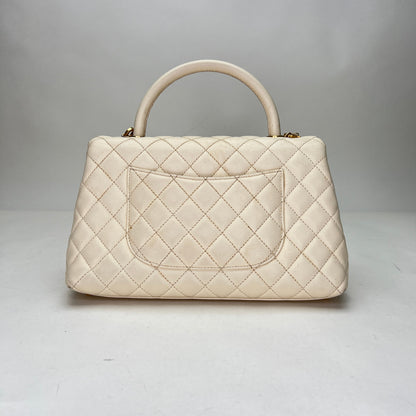 Coco Medium Beige Top Handle Bag in Caviar Leather, Gold hardware