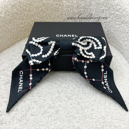 Chanel 23K Printed Pearl Motifs Bow Hair Clip in Black and Off White Fabric with Silver French Barrette