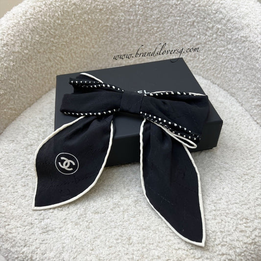 Chanel 23K Bow Barrette Hair Clip in Black and Off White Fabric
