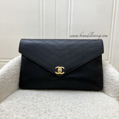 Chanel Clutch in Chevron Quilted Black Calf Leather and AGHW
