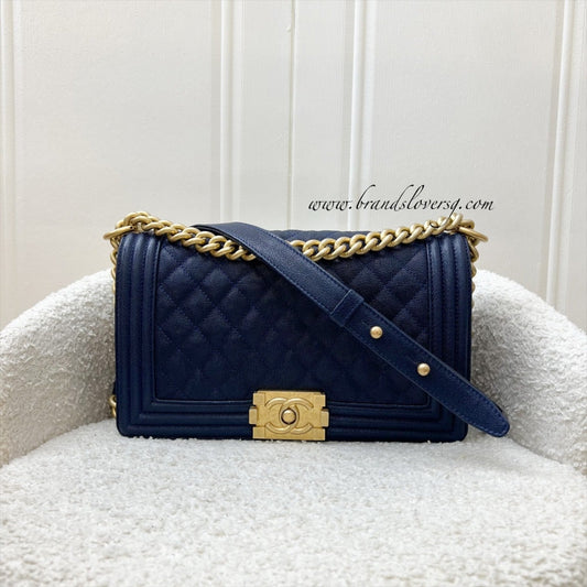 Chanel Medium 25cm Boy Flap in Midnight Blue Caviar and AGHW (Model: A67086)