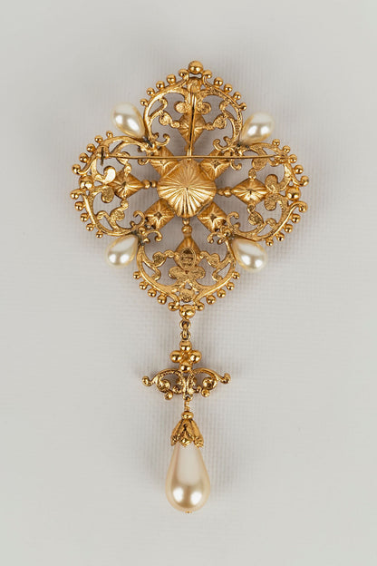 Imposante broche dorée Dior