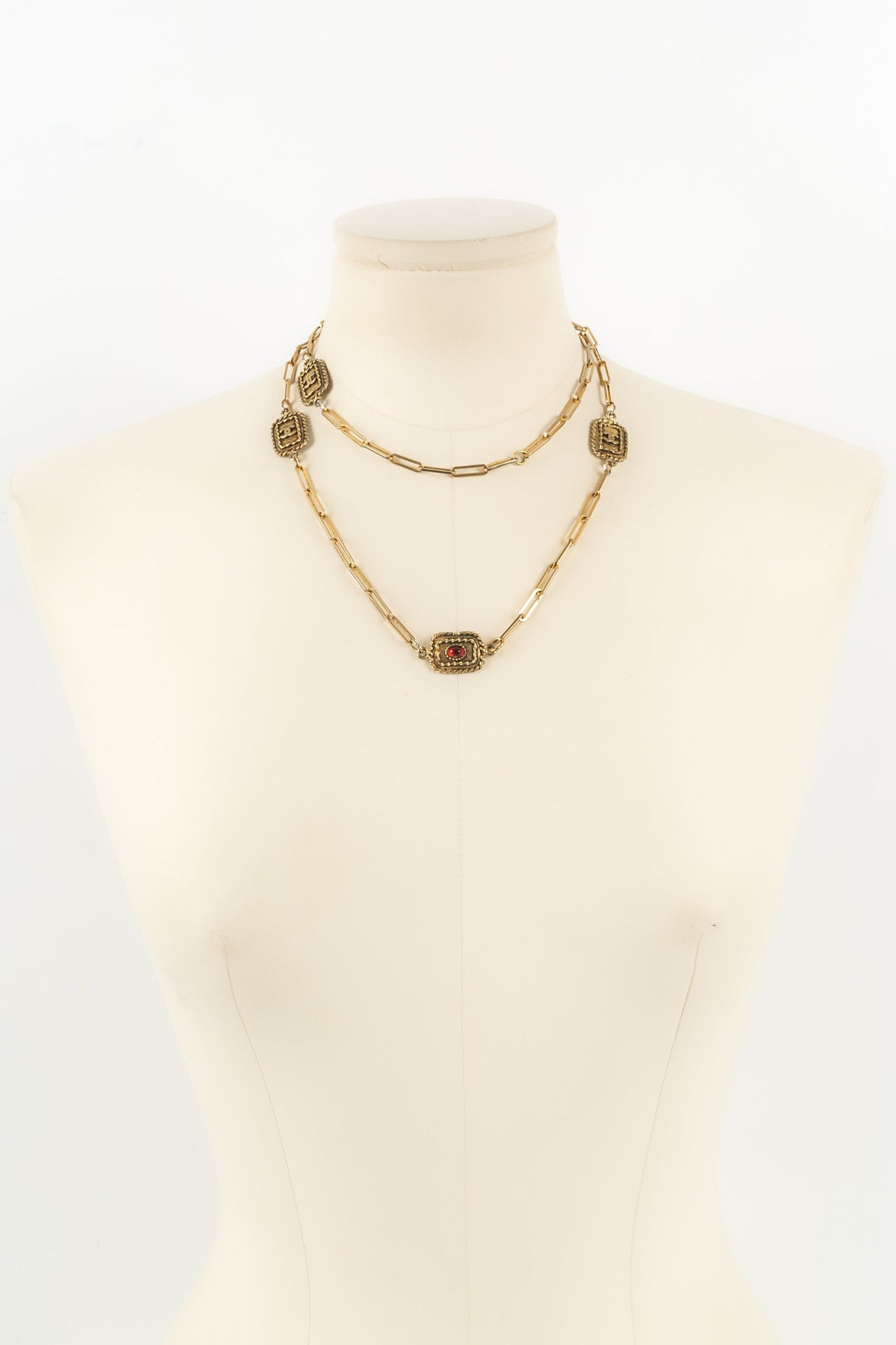 Collier doré Chanel 1984