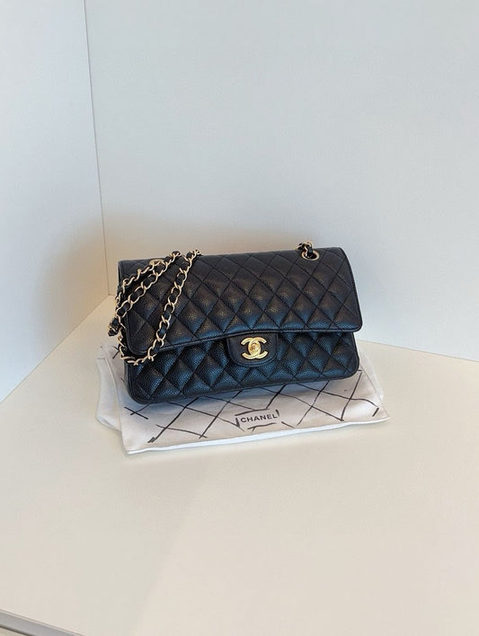 Chanel classic flap CF medium black caviar leather bag year