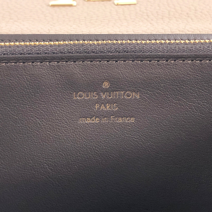 LOUIS VUITTON Taurillon Clemence leather IC chip purse lid