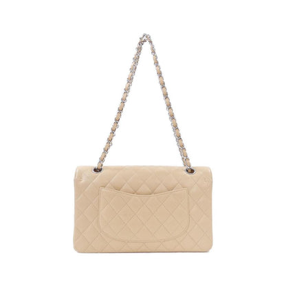 Chanel Caviar Classic beige bag