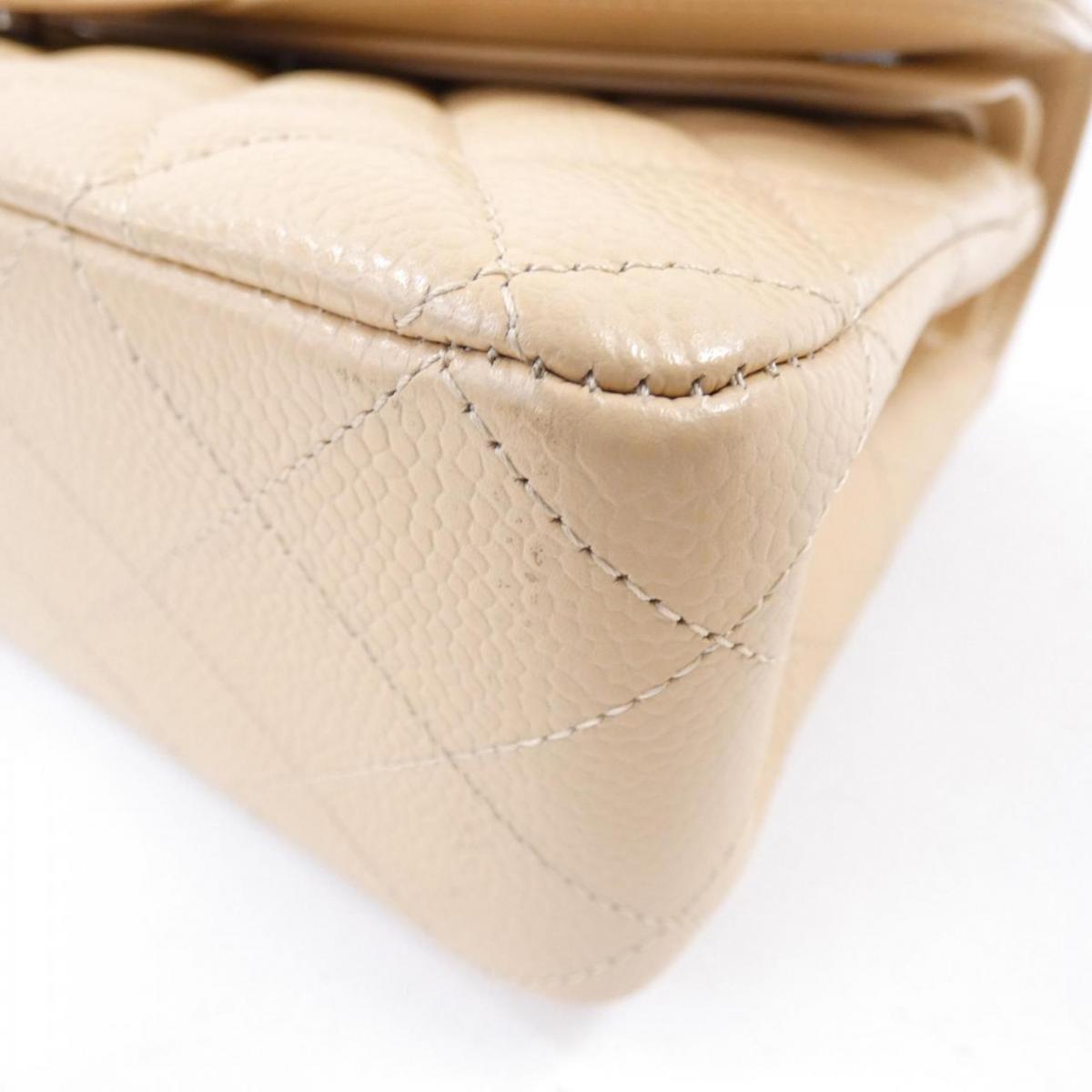 Chanel Caviar Classic beige bag
