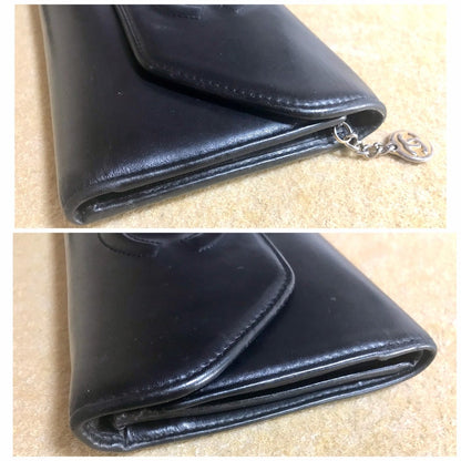 Chanel Vintage black leather wallet with large CC stitch mark